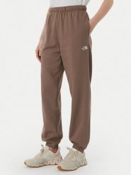 The North Face Spodnie dresowe Evolution Simple Dome NF0A8CWV Brązowy jasny Regular Fit. Brązowe spodnie dresowe damskie The North Face, s, bez wzorów, z bawełny. Za 279.99 zł.