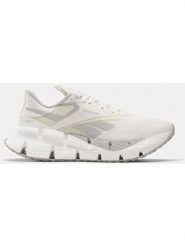 Reebok Buty "Floatzig 1" w kolorze białym do biegania rozmiar: 39. Białe obuwie sportowe damskie Reebok, z materiału, bez zapięcia, do biegania. Za 425.45 zł.