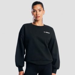 Bluza damska fitness oversize czarna Base. Czarne bluzy damskie GYMBEAM, s, bez wzorów, z bawełny, bez kaptura. Za 127.90 zł.