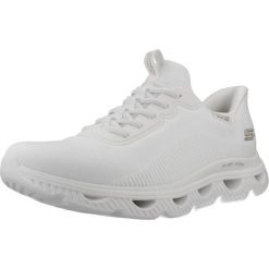 Buty SKECHERS SLIP-INS BOBS ARC WAVES Biały. Białe obuwie trekkingowe damskie Skechers, z syntetyku, bez zapięcia. Za 388.99 zł.