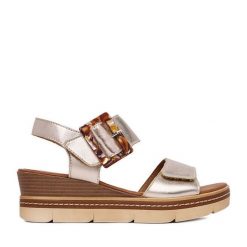 Sandały Remonte. Żółte sandały damskie Remonte, bez wzorów, bez obcasa, na koturnie, bez zapięcia. Za 379.99 zł.