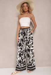 Czarne Spodnie o Szerokim Kroju High Waist w Kwiaty Nelrive. Czarne spodnie materiałowe damskie Renee, z aplikacjami, z jeansu. Za 49.99 zł.