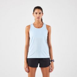 Koszulka do biegania bez rękawów damska Kiprun Run 100. Niebieskie koszulki damskie KALENJI, l, bez wzorów, z materiału, bez kołnierzyka, bez ramiączek. Za 29.99 zł.