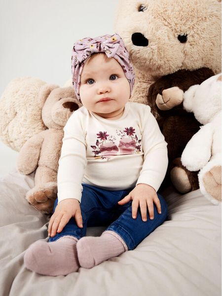 NAME IT Bluzka 13219542 Écru Regular Fit. Bluzki i koszule dziewczęce Name it, bez wzorów, z bawełny, bez kołnierzyka, bez ramiączek. Za 39.99 zł.