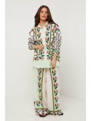 Lin Passion Lniana koszula w kolorze jasnozielonym ze wzorem rozmiar: 38/40. Zielone koszule damskie Lin Passion, bez wzorów, ze lnu, klasyczne, bez kołnierzyka, bez ramiączek. Za 152.99 zł.