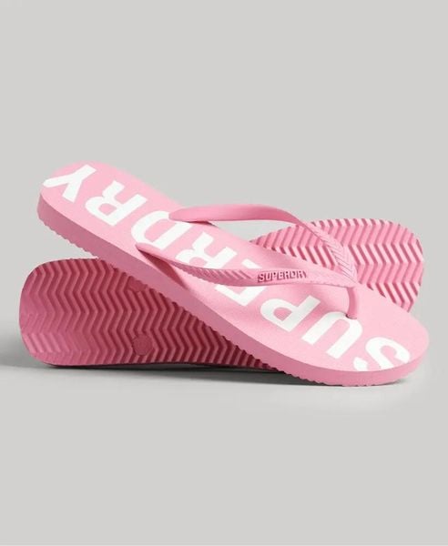 Superdry Klapki Code Core Sport z gumy — Marne Pink/Optic. Czerwone klapki damskie Superdry, bez wzorów, z gumy, bez obcasa, bez zapięcia. Za 152.65 zł.