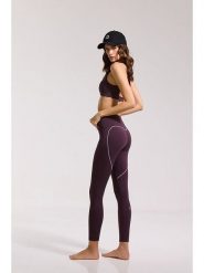 Onamaste Legginsy sportowe "Karma" w kolorze fioletowym rozmiar: L/XL. Różowe legginsy damskie Onamaste, l, bez wzorów, z materiału. Za 149.95 zł.