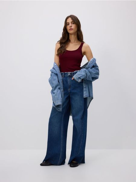 Jeansy wide leg z rozdarciami - niebieski. Niebieskie jeansy damskie Reserved. W wyprzedaży za 89.99 zł.