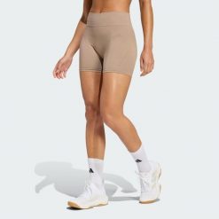 Legginsy Workout Essentials 4 inch. Brązowe legginsy damskie Adidas, bez wzorów. Za 129.00 zł.