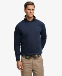 Superdry Bluza crew z raglanowymi rękawami Loose Fit – CLASSIC NAVY. Niebieskie bluzy damskie Superdry, l, bez wzorów, z bawełny, bez kaptura. Za 254.45 zł.