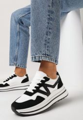Czarne Sneakersy na Piankowej Podeszwie ze Sznurowaniem i Ozdobną Wstawką Taelori. Czarne obuwie sportowe damskie Born2be, bez zapięcia. Za 109.99 zł.
