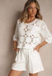 Biała Ażurowa Bluzka z Bawełny Nilonna. Białe bluzki damskie Renee, w ażurowe wzory, z bawełny, eleganckie, bez kołnierzyka, bez ramiączek. Za 99.99 zł.