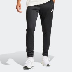 Spodnie treningowe do piłki nożnej ADIDAS Sereno. Czarne spodnie dresowe damskie Adidas, l, bez wzorów, z dresówki. Za 179.99 zł.