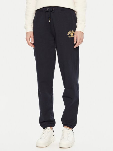 Guess Jeans Spodnie dresowe W5RB63 K68I4 Biały Regular Fit. Białe spodnie dresowe damskie Guess Jeans, xl, z aplikacjami, z bawełny. Za 169.99 zł.