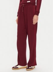Tommy Hilfiger Spodnie dresowe UW0UW04771 Bordowy Relaxed Fit. Czerwone spodnie dresowe damskie Tommy Hilfiger, xs, bez wzorów, z dresówki. Za 259.99 zł.
