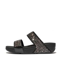 Sandały na koturnie z cekinami damskie FitFlop Lulu. Czarne sandały damskie FIT FLOP, bez wzorów, z materiału, bez obcasa, na koturnie, bez zapięcia. Za 469.00 zł.
