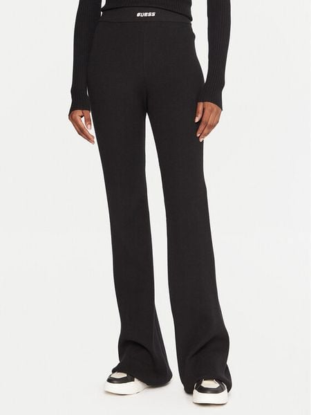 Guess Legginsy V5BB08 Z3JD2 Czarny Flare Fit. Czarne legginsy damskie Guess, s, z aplikacjami, z syntetyku. Za 279.99 zł.