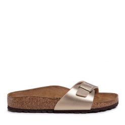 Klapki Birkenstock. Żółte klapki damskie Birkenstock, bez wzorów, bez obcasa, bez zapięcia. Za 279.99 zł.