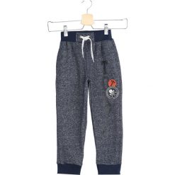 Ciemnoniebieskie Spodnie Dresowe Tokyo Boy. Spodnie dresowe chłopięce marki 4F. Za 29.99 zł.