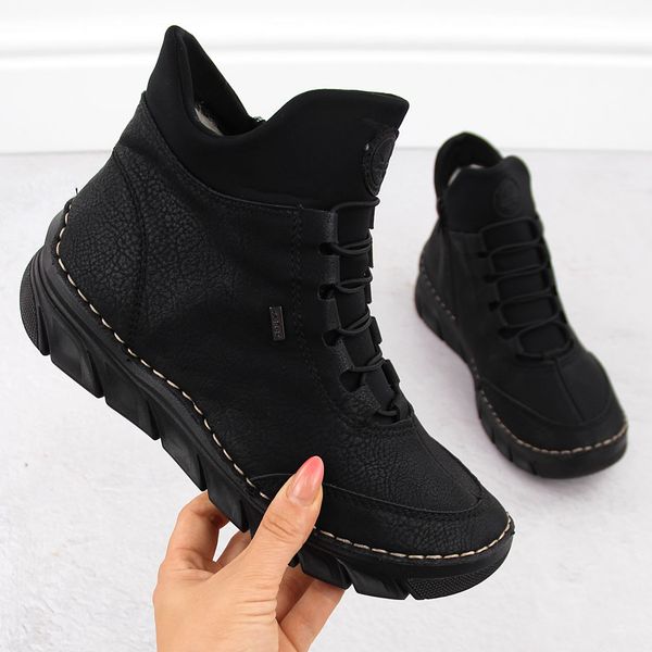 Botki damskie ocieplane czarne Rieker 55069-00. Czarne botki damskie Rieker, ze skóry ekologicznej, bez obcasa, bez zapięcia. Za 359.00 zł.