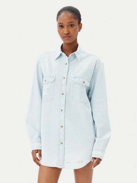 One Teaspoon Koszula jeansowa Everyday Chambray 24864 Błękitny Regular Fit. Niebieskie koszule damskie One Teaspoon, xs, bez wzorów, z bawełny, bez kołnierzyka, bez ramiączek. Za 399.99 zł.