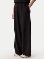 Tommy Jeans Spodnie dresowe DW0DW22951 Czarny Relaxed Fit. Czarne spodnie dresowe damskie Tommy Jeans, l, bez wzorów, z bawełny. Za 369.99 zł.