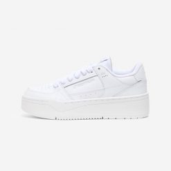 Sneakersy damskie CJ80 Platform skórzane. Białe obuwie sportowe damskie Decathlon, z gumy, bez zapięcia, trekkingowe. Za 219.99 zł.