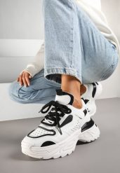 Biało-Czarne Sneakersy w Streetwearowym Stylu na Tłoczonej Podeszwie Nelasea. Białe obuwie sportowe damskie Renee, z jeansu, bez zapięcia. Za 109.99 zł.