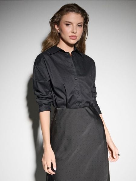 Bawełniana koszula - czarny. Czarne koszule damskie Sinsay, l, bez wzorów, z bawełny, bez kołnierzyka, bez ramiączek. Za 59.99 zł.