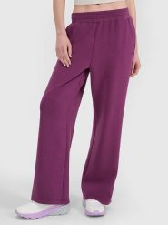 4F Spodnie dresowe w kolorze fioletowym rozmiar: S. Różowe spodnie dresowe damskie 4F, s, bez wzorów, z bawełny. Za 96.14 zł.