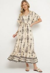 Jasnobeżowa Sukienka Rozkloszowana z Wiskozą w Boho Wzór z Falbaną Turaline. Brązowe sukienki damskie Born2be, bez wzorów, z wiskozy, boho, bez ramiączek. Za 99.99 zł.