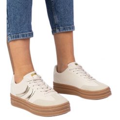 Beżowe sneakersy trampki damskie z złotym dodatkiem beżowy. Brązowe trampki damskie bez wzorów, z syntetyku, bez zapięcia. Za 96.19 zł.