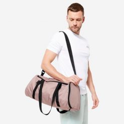 Torba fitness Domyos 20 l. Brązowe torby sportowe DOMYOS, bez wzorów, z materiału, średnie. Za 39.99 zł.