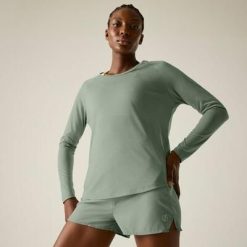 Damska koszulka z długim rękawem do biegania Nimble. Zielone bluzki damskie Dare 2b, bez wzorów, z lyocellu, sportowe, bez kołnierzyka, bez ramiączek. Za 159.99 zł.