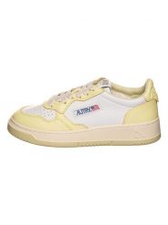 AUTRY Skórzane sneakersy "Autry" w kolorze biało-żółtym rozmiar: 39. Białe obuwie sportowe damskie AUTRY, ze skóry, bez zapięcia. Za 503.95 zł.