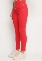 Czerwone Spodnie Skinny Kyllienne. Czerwone rurki damskie Born2be, na wiosnę, bez wzorów, z jeansu, z podwyższonym stanem. Za 64.99 zł.