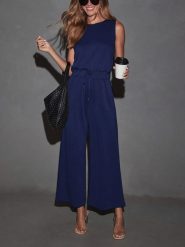 Milan Kiss Kombinezon w kolorze granatowym rozmiar: M. Niebieskie kombinezony damskie Milan Kiss, m, bez wzorów, z wiskozy, bez kołnierzyka, bez ramiączek. Za 173.99 zł.