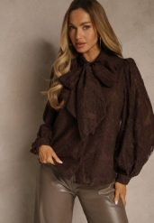 Brązowa Koszula z Koronki Zdobiona Bufiastymi Rękawami i Kokardą przy Dekolcie Sewene. Brązowe koszule damskie Renee, m, z aplikacjami, z koronki, eleganckie, bez kołnierzyka, bez ramiączek. Za 149.99 zł.