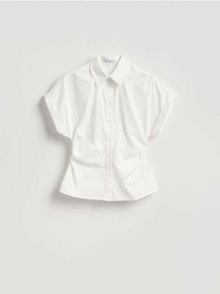 Taliowana koszula - biały. Białe koszule damskie Reserved, l, bez wzorów, z bawełny, bez kołnierzyka, bez ramiączek. Za 109.99 zł.