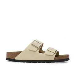 Klapki damskie Birkenstock Arizona. Brązowe klapki damskie Birkenstock, bez wzorów, z materiału, bez obcasa, bez zapięcia. Za 764.00 zł.