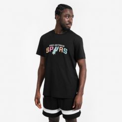 Koszulka do koszykówki unisex Tarmak NBA TS 900 San Antonio Spurs. Czarne bluzki damskie TARMAK, xs, bez wzorów, z bawełny, bez kołnierzyka, bez ramiączek. Za 79.99 zł.
