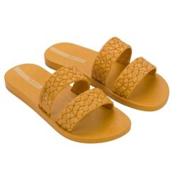 Klapki basenowe damskie Ipanema Renda II. Żółte klapki damskie Ipanema, bez wzorów, z jeansu, bez obcasa, bez zapięcia. Za 55.99 zł.