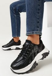 Czarne Sneakersy na Płaskiej Podeszwie z Wypustkami i Cholewką przed Kostkę Ozdobione Przeszyciami Adalynna. Czarne obuwie sportowe damskie Born2be, przed kostkę, bez zapięcia. Za 109.99 zł.