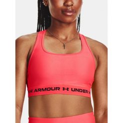 Stanik fitness Under Armour Crossback Mid. Czerwone biustonosze sportowe damskie Under Armour, bez wzorów. Za 78.99 zł.