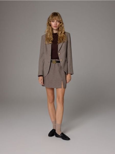 Skarpetki z wełną i domieszką kaszmiru - kremowy. Białe skarpetki damskie Reserved, bez wzorów, z dzianiny. Za 39.99 zł.