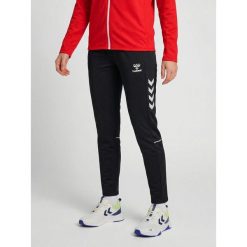 Damskie spodnie dresowe Hummel Core 2.0 Woven. Białe spodnie dresowe damskie Hummel, bez wzorów, z dresówki. Za 270.50 zł.