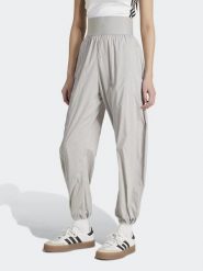 Adidas Spodnie dresowe w kolorze szarym rozmiar: XS. Szare spodnie dresowe damskie Adidas, xs, bez wzorów, z dresówki. Za 144.58 zł.