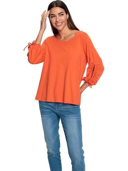 Heine Bluzka w kolorze pomarańczowym rozmiar: 38. Pomarańczowe bluzki damskie Heine, bez wzorów, bez kołnierzyka, bez ramiączek. Za 101.23 zł.