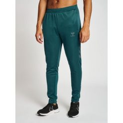 Spodnie dresowe polyesterowe Hummel Core XK. Zielone spodnie dresowe damskie Hummel, s, bez wzorów, z dresówki. Za 203.50 zł.