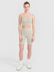 4F Legginsy kolarki bezszwowe treningowe damskie - beżowe XS/S. Brązowe legginsy damskie 4F, s, bez wzorów. W wyprzedaży za 59.99 zł.